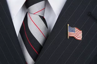 flag lapel pin on a suit