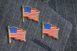 three flag pins on one lapel